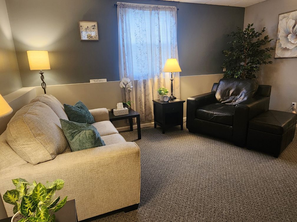Office picture with couch and chair